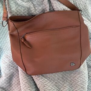 The Sak leather handbag (saddle color).